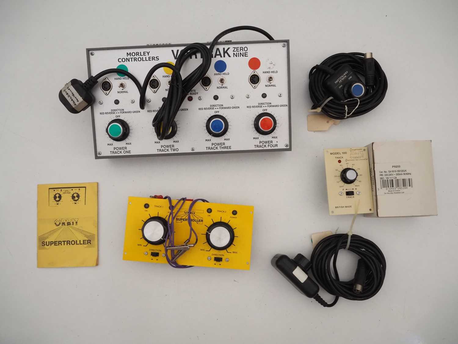 Lot 57 - A group of OO gauge model railway controllers...