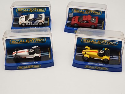 Lot 230 - SCALEXTRIC - 1:32 scale slot cars comprising 2...