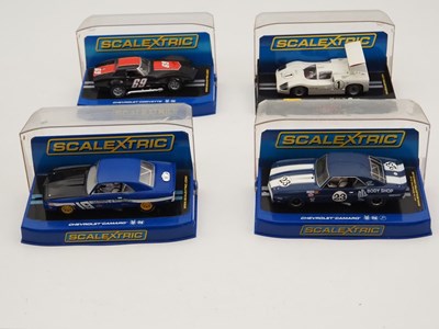 Lot 238 - SCALEXTRIC - 1:32 scale slot cars comprising...