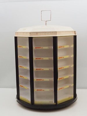 Lot 432 - A large revolving original DINKY TOYS shop...