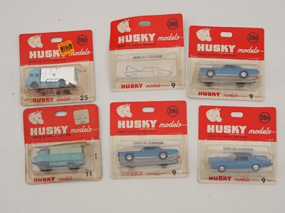 Lot 459 - A pair of HUSKY carded diecast lorries, sealed,...