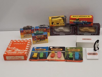 Lot 599 - A group of diecast car related merchandise...