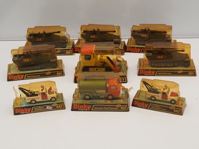 Lot 603 - DINKY - A group of diecast vehicles in bubble...
