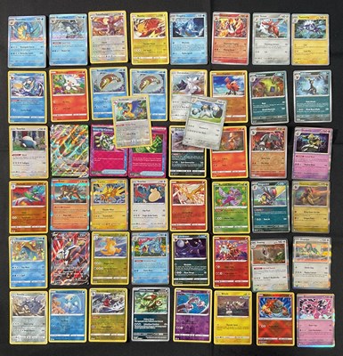 Lot 547 - A collection of 50 rare / holofoil Pokemon...