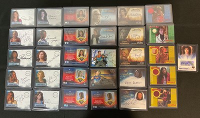 Lot 437 - DC Comics - A collection of trading cards for...