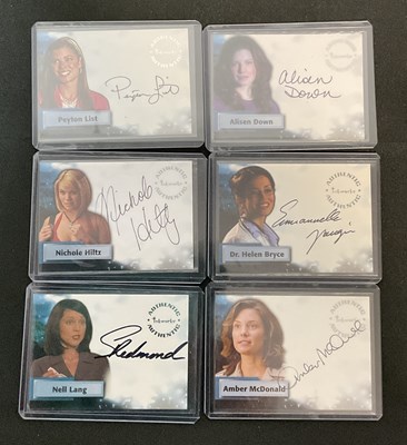 Lot 437 - DC Comics - A collection of trading cards for...