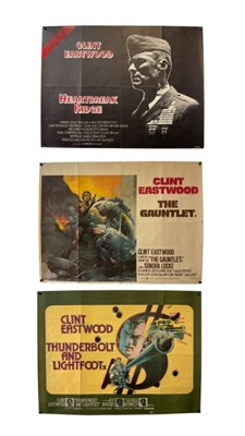 Lot 100 - CLINT EASTWOOD - A group of four UK Quad film...