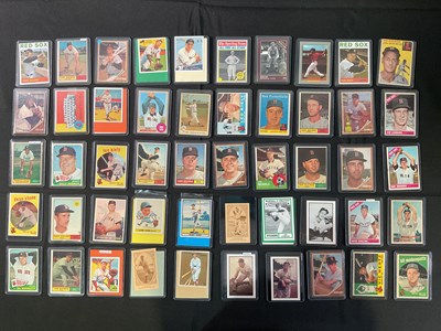Lot 505 - BASEBALL - A collection of trading cards for...
