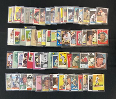 Lot 508 - BASEBALL - A collection of trading cards for...