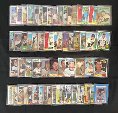 Lot 512 - BASEBALL - A collection of trading cards for...