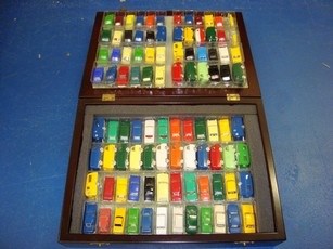 Lot 101 - VINTAGE TOYS: A wooden presentation case...