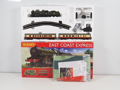 Lot 24 - A HORNBY OO gauge R1214 'East Coast Express'...