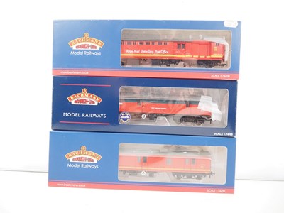Lot 87 - A group of BACHMANN OO gauge parcel vans /...