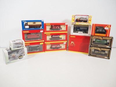 Lot 93 - A group of HORNBY OO gauge wagons including a...