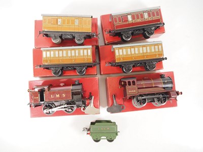 Lot 148 - HORNBY O gauge clockwork locomotives and...