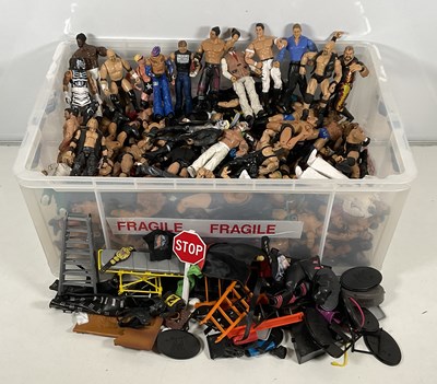 Lot 189 - WRESTLING: A large group of WWE/WWF and WCW...