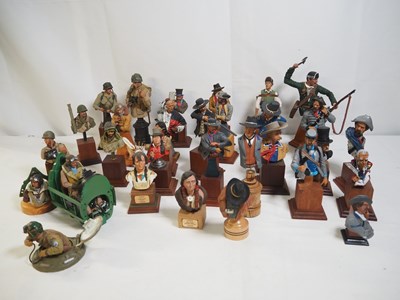 Lot 270 - A colony of painted resin sculptures and busts...