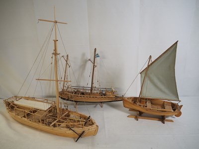 Lot 275 - A group of hand built wooden kit sailing ships...