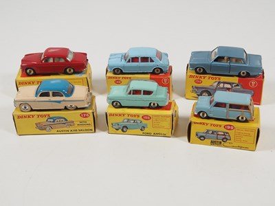 Lot 294 - A group of boxed DINKY diecast cars comprising...