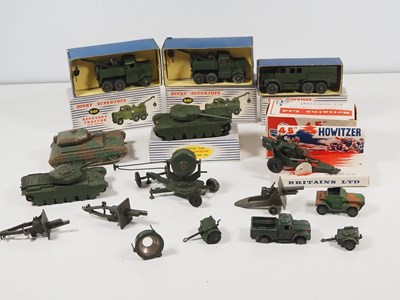 Lot 297 - A group of boxed and unboxed diecast military...