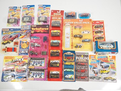 Lot 314 - A mixed group of carded and boxed MATCHBOX /...