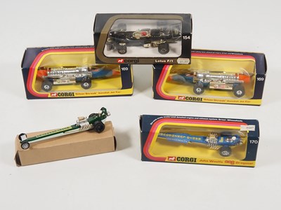 Lot 331 - CORGI racing cars - A 154 Lotus F1 car, 2x 169...