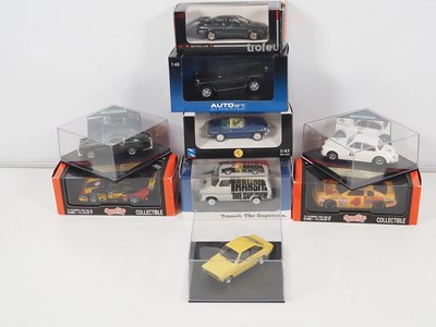 Lot 332 - A group of 1:43 scale cars by AUTOART, QUARTZO,...