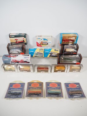Lot 409 - Diecast buses, lorries and trams in various...