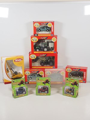 Lot 446 - A group of diecast agricultural vehicles by...
