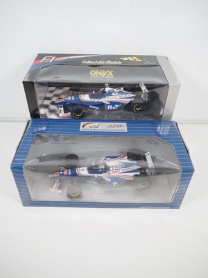 Lot 453 - ONYX - A pair of 1:18 scale diecast Formula 1...