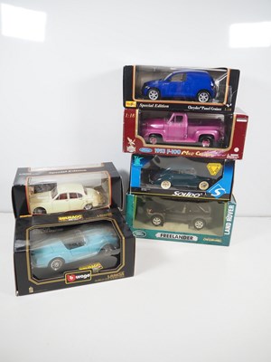 Lot 455 - A group of 1:18 scale diecast cars by BBURAGO,...