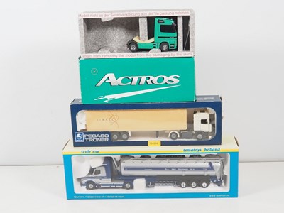 Lot 519 - A pair of branded TEKNO 1:50 scale diecast...