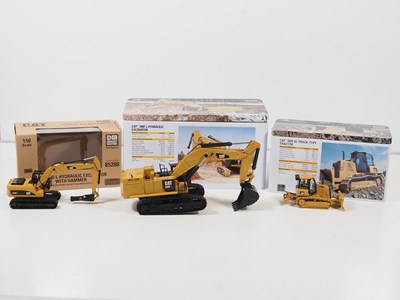Lot 524 - DIECAST MASTERS - A group of 1:50 scale CAT...