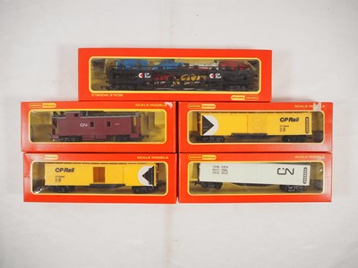 Lot 323 - HORNBY - OO gauge Canadian issue wagons in...