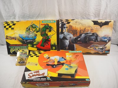 Lot 505 - MICRO SCALEXTRIC - A group of three TV/Film...