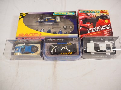 Lot 515 - SCALEXTRIC - A group of boxed 1:32 scale slot...