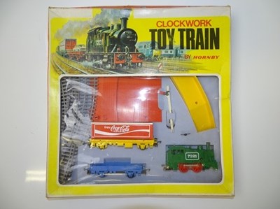 Lot 379 - OO GAUGE MODEL RAILWAYS: A HORNBY clockwork...