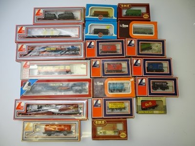 Lot 588 - OO GAUGE MODEL RAILWAYS: A group of wagons by...