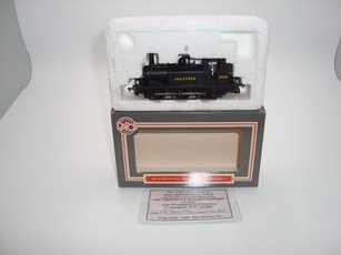 Lot 73 - OO GAUGE MODEL RAILWAYS: A DAPOL Terrier steam...