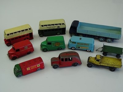 Lot 86 - DINKY: A group of playworn DINKY lorries and...