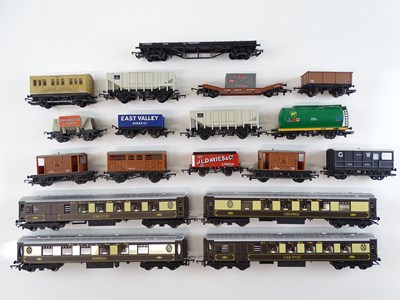 Lot 430 - A group of unboxed wagons and coaches mostly...