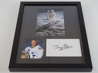 Lot 152 - APOLLO 11: A framed and glazed BUZZ ALDRIN...