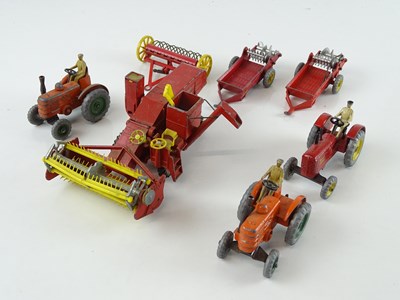 Lot 101 - A group of CORGI and DINKY tractors and...