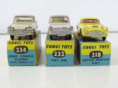 Lot 104 - A group of CORGI Toys cars comprising: a 218...