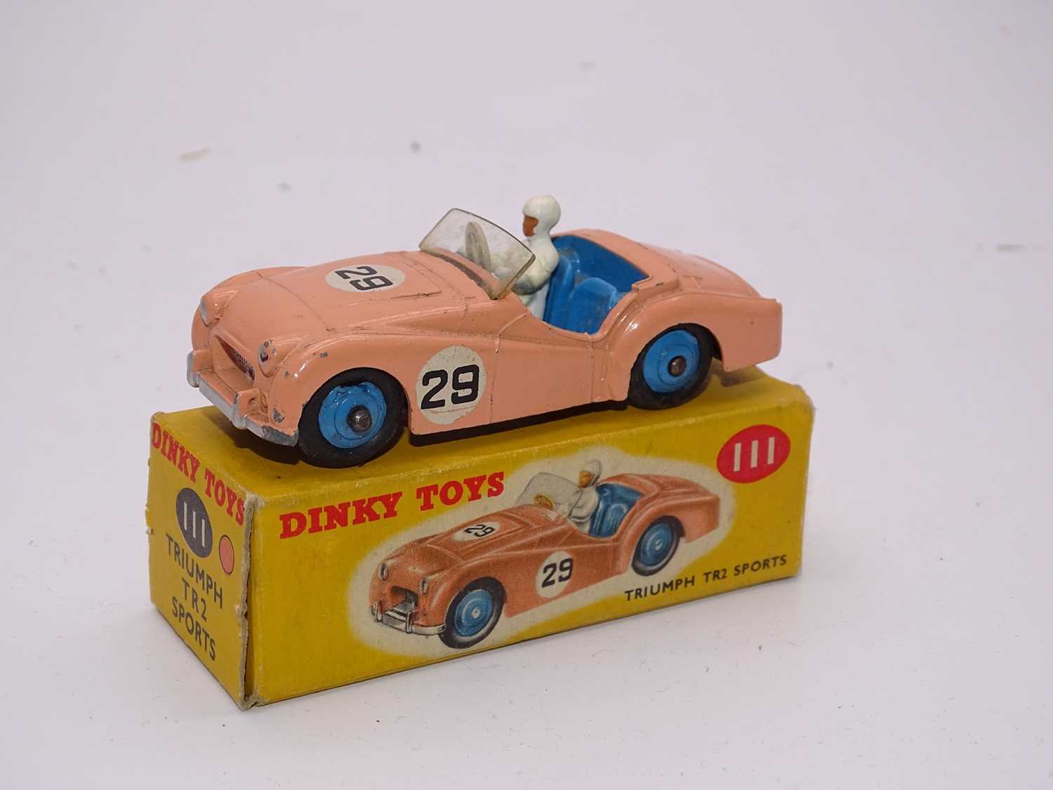 Lot 137 - A DINKY Toys 111 Triumph TR2 (Competition...