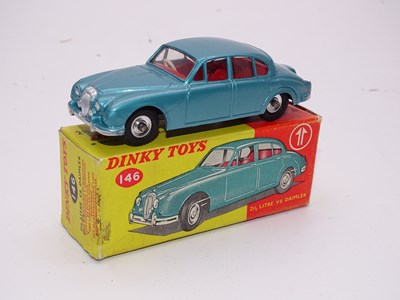 Lot 139 - A DINKY Toys 146 Daimler 2.5 litre V8 - VG in...