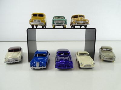 Lot 14 - A group of DINKY and CORGI cars and vans all...