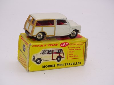 Lot 143 - A DINKY Toys 197 Morris Mini Traveller -...