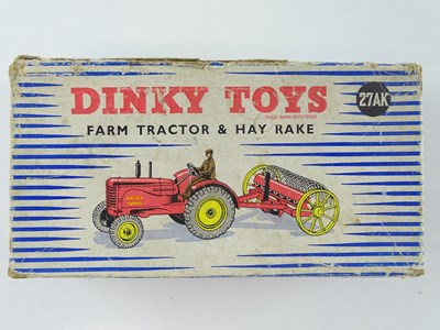 Lot 149 - A DINKY Toys 27AK Tractor and Hay Rake - F in...