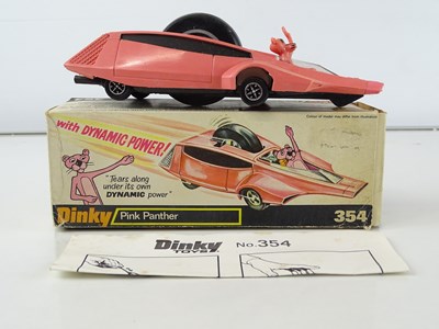 Lot 154 - A DINKY Toys 354 Pink Panther car - G/VG in...